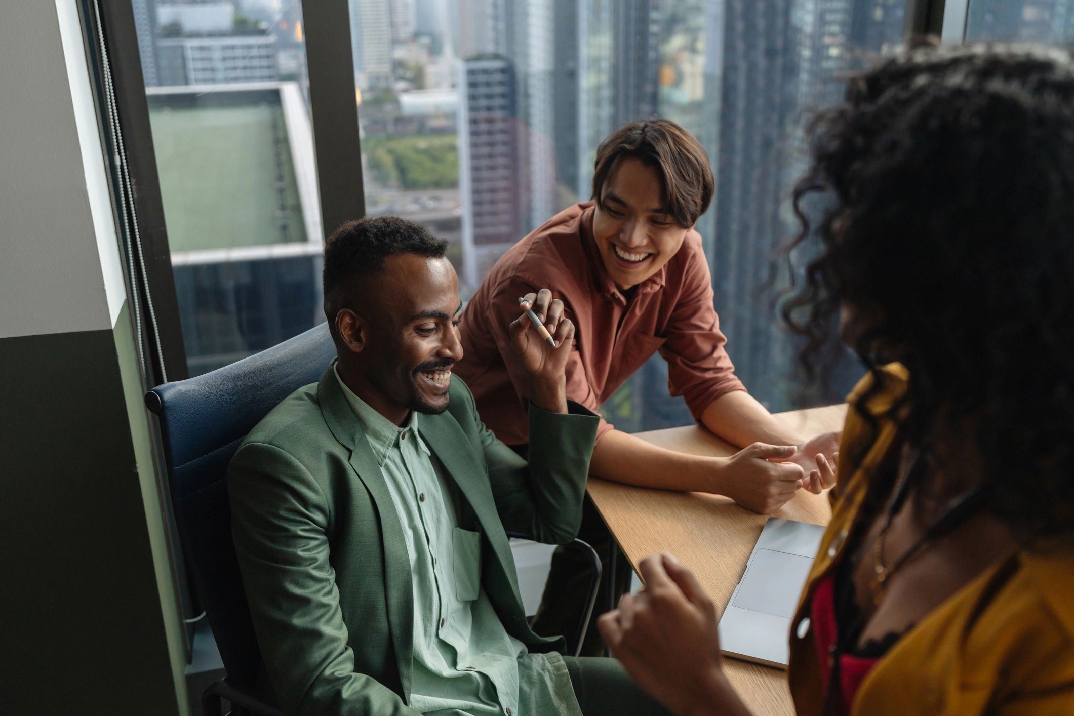 Financial operations professionals discussing workflow improvements in an office